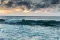 Beautiful sunset shoreline at tropical sandy beach in Oahu island