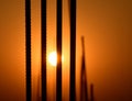 Sunset with Silhouette Iron Made Objects Photograph