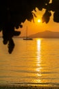 Beautiful sunset and silhouette sailing boats.