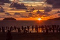 Beautiful sunset with silhouette tourist at Tanjung aru Beach, Kota Kinabalu, Sabah., Borneo Royalty Free Stock Photo