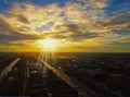 Beautiful sunset sky above the city with sky blue and orange light of the sun through the clouds in the sky  Orange and red Royalty Free Stock Photo