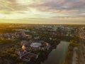 Beautiful sunset sky above the city with sky blue and orange light of the sun through the clouds in the sky  Orange and red Royalty Free Stock Photo