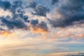 Beautiful sunset sky above clouds with dramatic light. Sunset sky for background, sunrise sky and clouds. Bright orange and blue Royalty Free Stock Photo