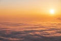 Sunset sky above clouds, dramatic sunset sky. Nature background, aerial view. Royalty Free Stock Photo