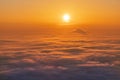 Sunset sky above clouds, dramatic sunset sky. Nature background, aerial view. Royalty Free Stock Photo