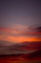 Beautiful sunset sky with amazing colorful clouds against deep Royalty Free Stock Photo