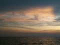 Beautiful sunset sky background on the tropical calm sea. Horizon over the water Royalty Free Stock Photo
