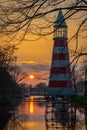 A beautiful sunset sky behind the lighthouse in dutch city of Breda, Province North Brabant