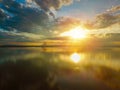 Beautiful Sunset in the sky with sky blue and orange light of the sun through the clouds in the sky  Orange and red dramatic Royalty Free Stock Photo