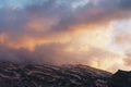 Beautiful sunset sky with clouds over the mountain range Royalty Free Stock Photo