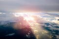 Beautiful sunset sky clouds seeing through the airplane windows. Royalty Free Stock Photo