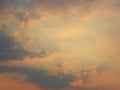 Beautiful sunset sky and dark clouds with dramatic light, Twilight sky background, Bright orange sky and light of the sun in Royalty Free Stock Photo