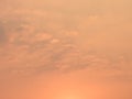Beautiful sunset sky and dark clouds with dramatic light, Twilight sky background, Bright orange sky and light of the sun in Royalty Free Stock Photo