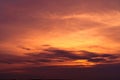 Beautiful sunset sky. Golden sky at sunset. Art picture of sky and dark clouds at dusk. Peaceful and tranquil concept. Twilight Royalty Free Stock Photo