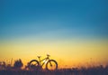 Beautiful sunset sky and Mountain bike silhouette Royalty Free Stock Photo