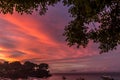 Beautiful sunset with sky over calm sea in tropical Bali island, Indonesia. Royalty Free Stock Photo