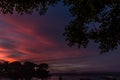 Beautiful sunset with sky over calm sea in tropical Bali island, Indonesia. Royalty Free Stock Photo