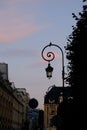 Beautiful Sunset in the sky of the Place des Vosges in Paris, France - vertical shot Royalty Free Stock Photo