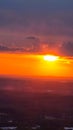 A beautiful sunset in the sky with powerful clouds over the city skyline at The Sun Dial Restaurant in Atlanta Georgia USA Royalty Free Stock Photo