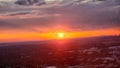 A beautiful sunset in the sky with powerful clouds over the city skyline at The Sun Dial Restaurant in Atlanta Georgia USA Royalty Free Stock Photo