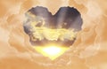Beautiful Sunset. Sky With Shining Sun, View Through Heart Shaped Gap Formed From Clouds