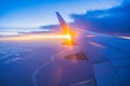 Beautiful sunset, sky on the top view, airplane flying view from inside window aircraft. Royalty Free Stock Photo