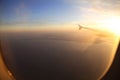Beautiful sunset and sky was taken from window seat on the airplane fly around the world Royalty Free Stock Photo