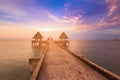 Beautiful sunset skyline with walking way leading to ocean Royalty Free Stock Photo