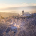 Beautiful sunset at the small Norwegian town Roros. Church in the evening sun. Royalty Free Stock Photo