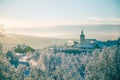 Beautiful sunset at the small Norwegian town Roros. Church in the evening sun. Royalty Free Stock Photo