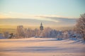 Beautiful sunset at the small Norwegian town Roros. Church in the evening sun. Royalty Free Stock Photo