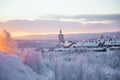 Beautiful sunset at the small Norwegian town Roros. Church in the evening sun. Royalty Free Stock Photo