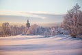 Beautiful sunset at the small Norwegian town Roros. Church in the evening sun. Royalty Free Stock Photo