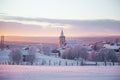 Beautiful sunset at the small Norwegian town Roros. Church in the evening sun. Royalty Free Stock Photo