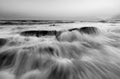 Beautiful sunset at the stone beach in black and white Royalty Free Stock Photo