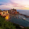 Beautiful sunset in summer Vernazza - one of five famous villages of Cinque Terre National Park in Liguria, Italy, suspended Royalty Free Stock Photo