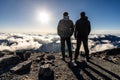 Hikers on the summit of Mt. Kita at sunset, tallest mountain in the Japanese Southern Alps