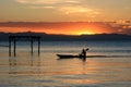 Beautiful sunset with traditional kayak on Lake Malawi