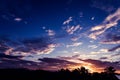 Beautiful sunset of a tropical beach silhouettes of trees Royalty Free Stock Photo