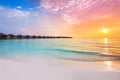 Beautiful sunset at tropical resort with overwater bungalows Royalty Free Stock Photo