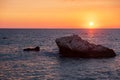 Beautiful sunset view of the beach around Petra tou Romiou, also known as Aphrodite`s birthplace, in Paphos, Cyprus Royalty Free Stock Photo