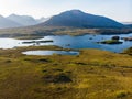 Beautiful sunset view of Connemara. Scenic Irish countryside landscape with magnificent mountains on the horizon, County Galway, I Royalty Free Stock Photo