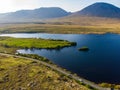 Beautiful sunset view of Connemara. Scenic Irish countryside landscape with magnificent mountains on the horizon, County Galway, I Royalty Free Stock Photo