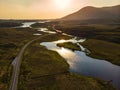 Beautiful sunset view of Connemara. Scenic Irish countryside landscape with magnificent mountains on the horizon, County Galway, I Royalty Free Stock Photo