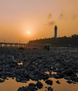 Beautiful sunset view, lighthouse, bridge and astronomical low tide at Kavaratti island lakshadweep Royalty Free Stock Photo