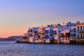 Beautiful sunset view of Little Venice in Mykonos, Greece. Romantic neighborhood with whitewashed bars, cafes Royalty Free Stock Photo
