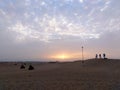 beautiful sunset view over the sandy dunes in Dubai desert. Royalty Free Stock Photo