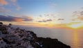 Beautiful of sunset view point the landmark of skyline with  windmill and Church of Santorini. Oia town on Santorini island, Royalty Free Stock Photo