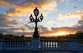 Beautiful sunset view seen from Alexandre III bridge in Paris, France Royalty Free Stock Photo