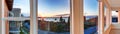Beautiful sunset view through the windows. Panoramic picture Royalty Free Stock Photo